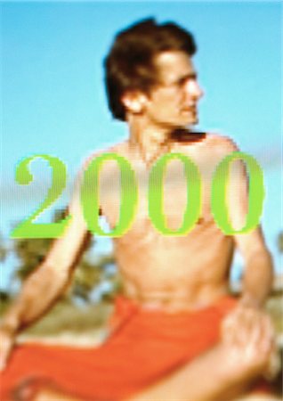 simsearch:696-03397950,k - Man on beach in loincloth, "2000" Stock Photo - Premium Royalty-Free, Code: 696-03397934