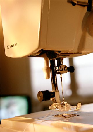 sewing needle close up - Sewing machine, close-up Stock Photo - Premium Royalty-Free, Code: 696-03398105