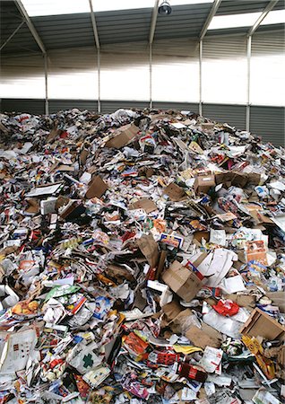 Trash piled in recycling center Stock Photo - Premium Royalty-Free, Code: 696-03398437