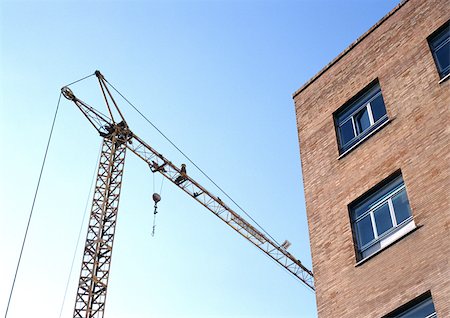 simsearch:696-03398616,k - Building and crane, low angle view Stock Photo - Premium Royalty-Free, Code: 696-03398592