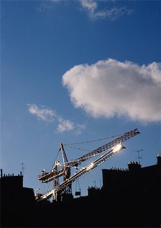 simsearch:614-06718256,k - Cranes above rooftops Stock Photo - Premium Royalty-Free, Code: 696-03398606