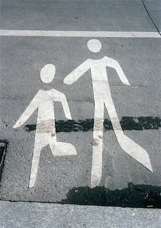 pictogram character - Pedestrian symbol painted on road Stock Photo - Premium Royalty-Free, Code: 696-03398796
