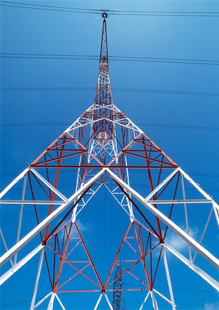 power pylon blue sky - Pylon, low angle view Foto de stock - Sin royalties Premium, Código: 696-03399029