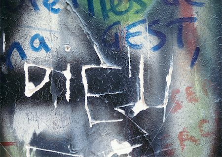 Texte de Dieu en anglais rayé sur le mur de graffitis, gros plan Photographie de stock - Premium Libres de Droits, Code: 696-03399153