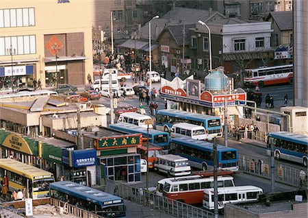 Chine, Province de Liaoning, Dalian, occupé de bus terminal, haute angle vue Photographie de stock - Premium Libres de Droits, Code: 696-03399257