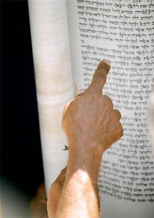 Israel, Jerusalem, hand pointing at the Torah, close-up Stock Photo - Premium Royalty-Free, Code: 696-03399370