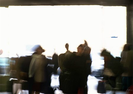 people airports silhouettes - Silhouettes of people, blurred Stock Photo - Premium Royalty-Free, Code: 696-03399397