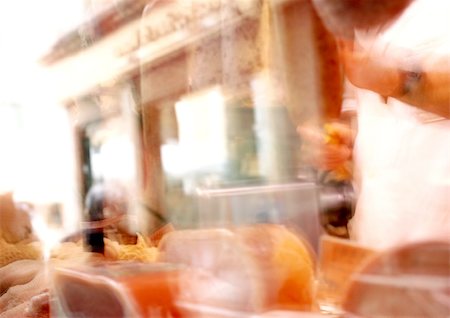 food shop windows - Monument, person and deli counter, superimposed, blurred Stock Photo - Premium Royalty-Free, Code: 696-03399958