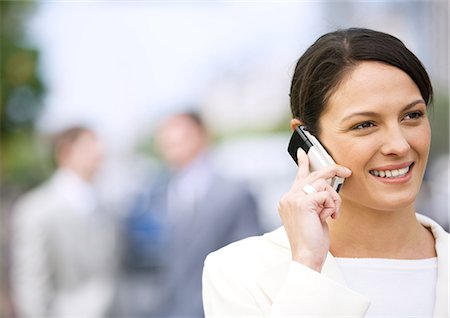 simsearch:695-03380514,k - Businesswoman using cell phone Stock Photo - Premium Royalty-Free, Code: 696-03400203