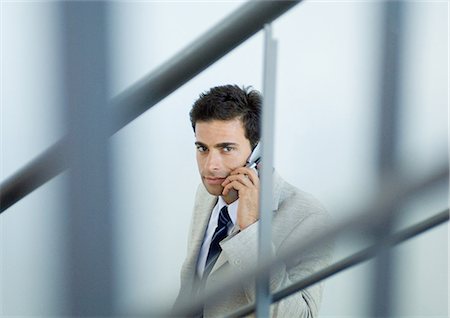 simsearch:695-03381633,k - Businessman using cell phone Stock Photo - Premium Royalty-Free, Code: 696-03400231