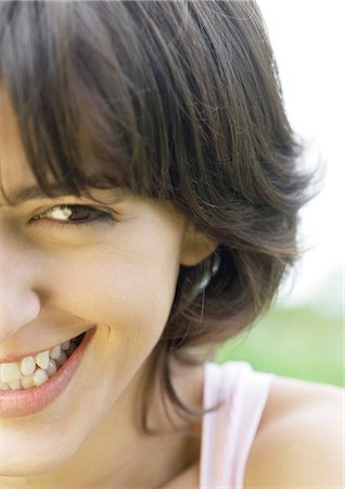 simsearch:632-01154783,k - Young woman laughing, cropped, portrait Stock Photo - Premium Royalty-Free, Code: 696-03400293