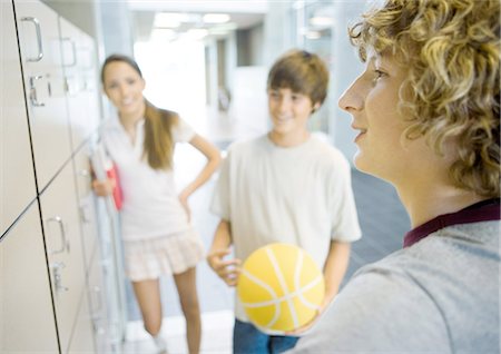 simsearch:632-01156768,k - Teenagers talking near lockers Stock Photo - Premium Royalty-Free, Code: 696-03400729