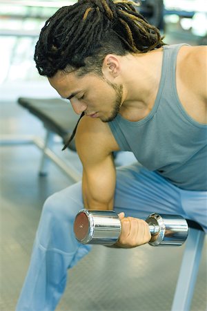 simsearch:695-03375202,k - Man working out with dumbbells Stock Photo - Premium Royalty-Free, Code: 696-03401314