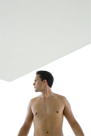 simsearch:695-03377755,k - Barechested man looking away, backlit Stock Photo - Premium Royalty-Free, Code: 696-03402119
