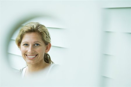 framing face - Woman smiling Stock Photo - Premium Royalty-Free, Code: 696-03402141