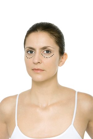 simsearch:632-07539926,k - Woman with plastic surgery markings under her eyes, portrait Stock Photo - Premium Royalty-Free, Code: 696-03402536
