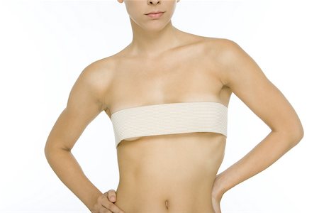 simsearch:695-03379049,k - Femme nue au bandage enroulé autour des seins, recadrée vue Photographie de stock - Premium Libres de Droits, Code: 696-03402531