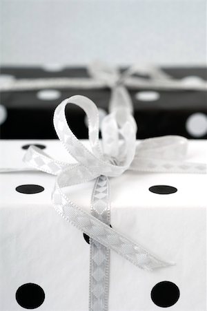 simsearch:649-08969038,k - Two gift-wrapped presents Stock Photo - Premium Royalty-Free, Code: 696-03402847