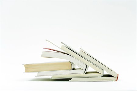 simsearch:628-02198065,k - Books stacked one inside the other Stock Photo - Premium Royalty-Free, Code: 696-03402865