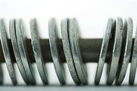 eisenwaren - Metal washers on screw, extreme close-up Foto de stock - Sin royalties Premium, Código: 696-03402928