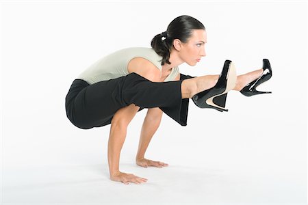 Woman with high heels exercising Stock Photo - Premium Royalty-Free, Code: 693-05552940