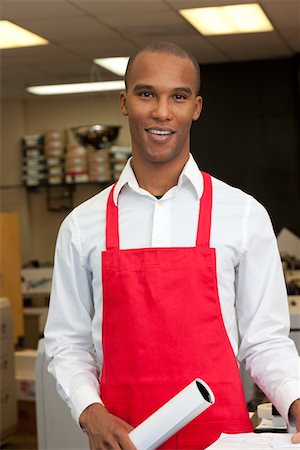 printing plant - Portrait of African American man smiling Stock Photo - Premium Royalty-Free, Code: 693-05794017