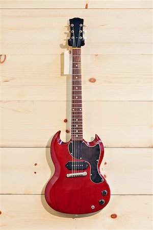 small business sales - Mahogany guitar with label Stock Photo - Premium Royalty-Free, Code: 693-05794339