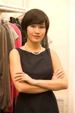 designer shops - Portrait of confident Asian fashion designer standing with arms crossed Stock Photo - Premium Royalty-Free, Code: 693-05794430