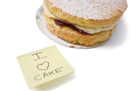 sponge not person - Cake slice with 'I love cake' sign on sticky notepaper Foto de stock - Sin royalties Premium, Código: 693-05794518