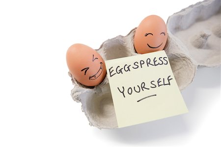 Two eggs with a 'eggspress yourself' note Stock Photo - Premium Royalty-Free, Code: 693-05794526