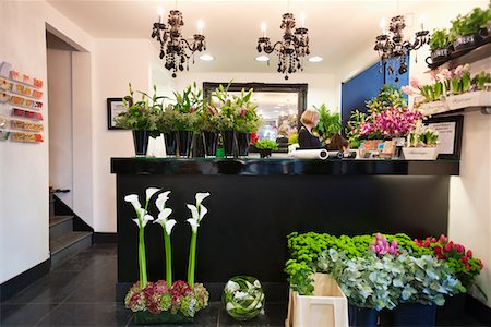 Woman working in florist shop Foto de stock - Sin royalties Premium, Código: 693-05794559