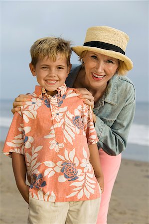person in hawaiian shirt - Grandmother and Grandson on Beach Stock Photo - Premium Royalty-Free, Code: 693-06014054