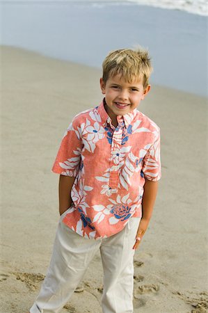 person in hawaiian shirt - Boy on Beach Stock Photo - Premium Royalty-Free, Code: 693-06014053