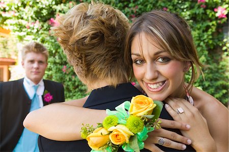 simsearch:694-03318761,k - Well-dressed teenagers hugging outside Stock Photo - Premium Royalty-Free, Code: 693-06014143