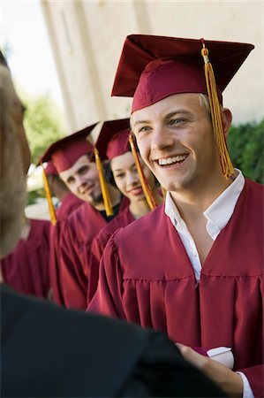 simsearch:693-06014222,k - Graduates in line for degree outside Stock Photo - Premium Royalty-Free, Code: 693-06014215