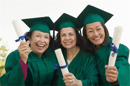 simsearch:693-06014222,k - Senior Graduates hoisting diplomas outside, portrait Stock Photo - Premium Royalty-Free, Code: 693-06014213