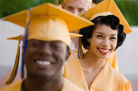 simsearch:693-06014222,k - Graduates in line for degree outside, focus on woman Stock Photo - Premium Royalty-Free, Code: 693-06014227