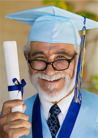 simsearch:693-06014222,k - Senior graduate holding diploma outside, portrait Stock Photo - Premium Royalty-Free, Code: 693-06014223