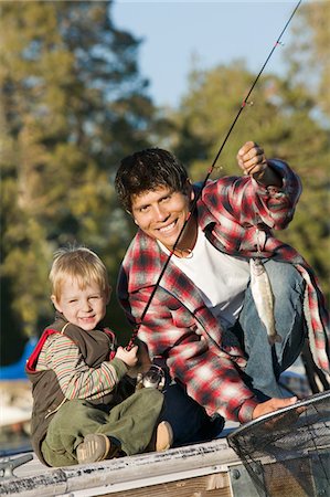 Father and Son fly fishing Stock Photo - Premium Royalty-Free, Code: 693-06014329