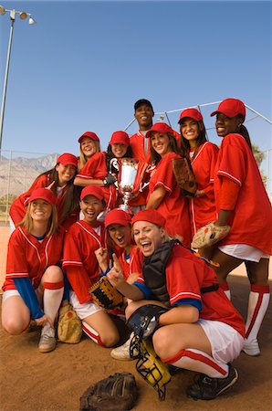 Women's softball team with trophy, portrait Stock Photo - Premium Royalty-Free, Code: 693-06014488