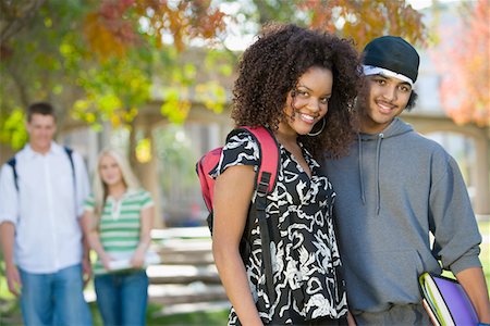 Young student couple on campus, (portrait) Stock Photo - Premium Royalty-Free, Code: 693-06014824