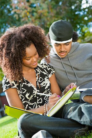 Student couple studying outdoors Stock Photo - Premium Royalty-Free, Code: 693-06014823