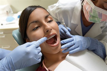 simsearch:693-06014951,k - Teenage girl (13-16) at dentists, (close-up) Stock Photo - Premium Royalty-Free, Code: 693-06014944