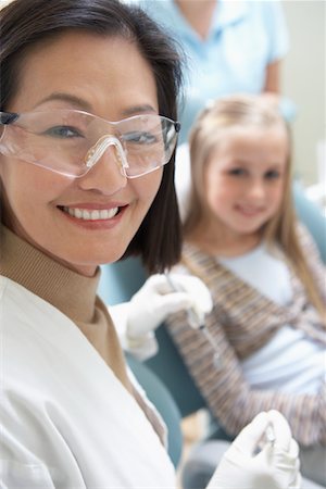 simsearch:693-06014951,k - Female dentist with girl in surgery, (portrait) Stock Photo - Premium Royalty-Free, Code: 693-06014947