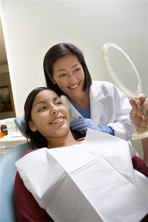 simsearch:693-06014951,k - Teenage girl (13-16) with dentist in surgery Stock Photo - Premium Royalty-Free, Code: 693-06014943