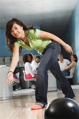 simsearch:693-06015216,k - Young woman releasing bowling ball, portrait Stock Photo - Premium Royalty-Free, Code: 693-06015218