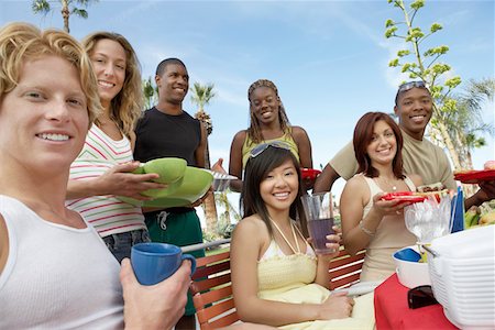 Young people eating outside in summer Stock Photo - Premium Royalty-Free, Code: 693-06015239