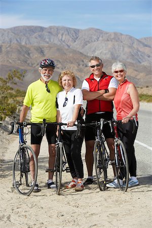 simsearch:693-06015367,k - Two couples on bicycle ride, group portrait Stock Photo - Premium Royalty-Free, Code: 693-06015366