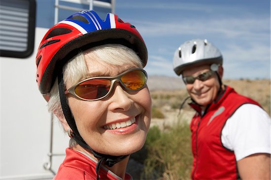 Couple on bicycle ride, portrait Stock Photo - Premium Royalty-Free, Image code: 693-06015363