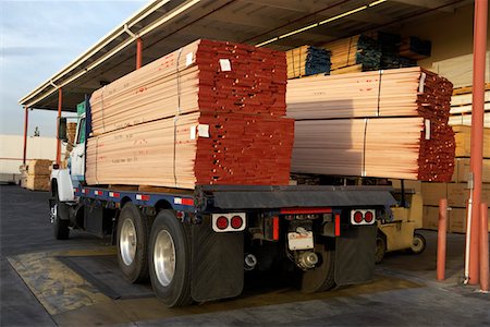 Wood stacked on a truck, rear view Stock Photo - Premium Royalty-Free, Code: 693-06015574